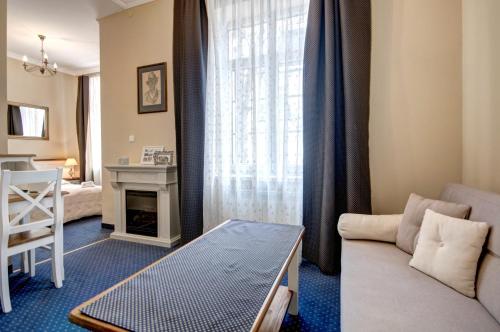Un pat sau paturi într-o cameră la Willa Roztoka