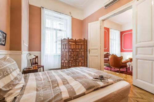 Ліжко або ліжка в номері Maison Orange & Maison Rose Apartments