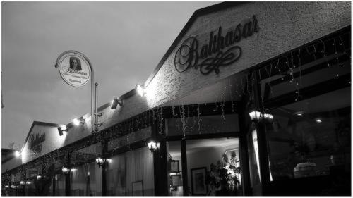 a black and white photo of the front of a restaurant at Balthasar Neumann Speiserei & Gästehaus - Zentrum Brühl -E-Ladestation, nähe Phantasialand in Brühl