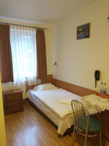 Postel nebo postele na pokoji v ubytování Hotel Górsko