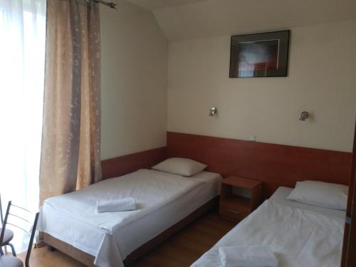 Postel nebo postele na pokoji v ubytování Hotel Górsko