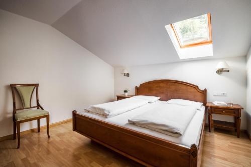 Ένα ή περισσότερα κρεβάτια σε δωμάτιο στο Apartments Mühlegg