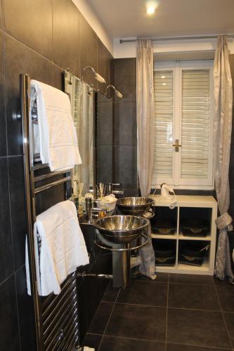 a bathroom with a sink and a shower at B&b My Bergamo in Bergamo