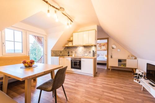 Kuchyň nebo kuchyňský kout v ubytování Winzer Suite - Weingut Dietl
