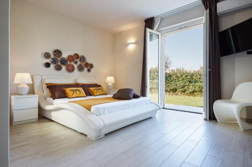 Postel nebo postele na pokoji v ubytování Villa Giame - Heated Pool, Beach at 350m