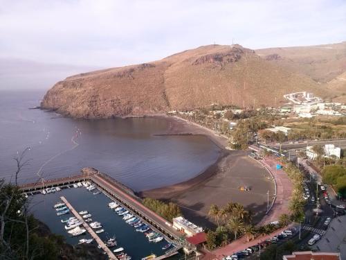 an aerial view of a harbor with boats in the water at LOS FRAILES I in San Sebastián de la Gomera