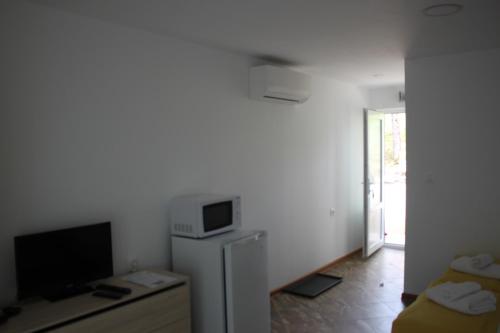 Daskalov Bungalowsにあるテレビまたはエンターテインメントセンター