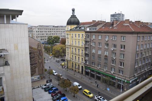 a view of a city street with cars and buildings at Slavyanska Beseda Hotel in Sofia