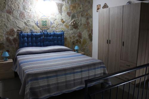 Posteľ alebo postele v izbe v ubytovaní Casa Azzurra