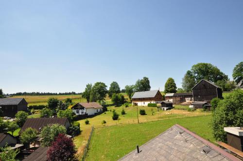 an aerial view of a small village with houses at Landhotel Weisses Röß`l in Adorf