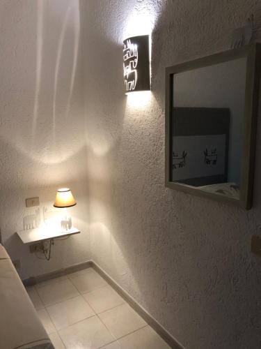 Vannas istaba naktsmītnē Hotel Canne al Vento