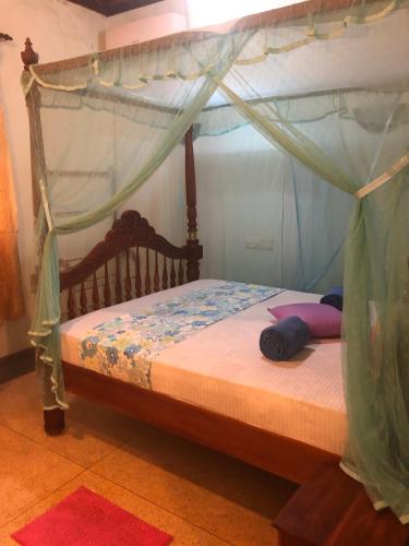 Ein Bett oder Betten in einem Zimmer der Unterkunft Tiny Royal Palace