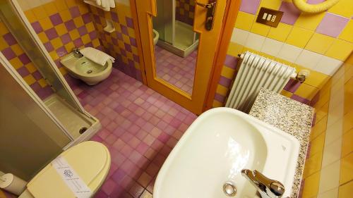 Koupelna v ubytování Hotel Antares
