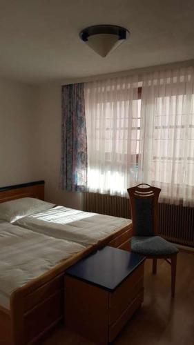 
Ein Bett oder Betten in einem Zimmer der Unterkunft Dretenpacherhof
