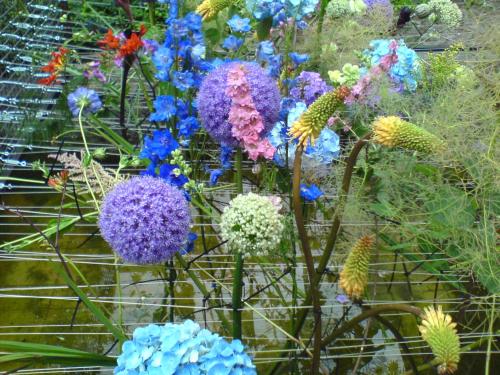 a bunch of different colored flowers in a garden at Villa Florentine in Bad Liebenstein