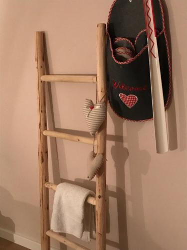 a ladder with a hat and a towel at Haus Nohra in Sankt Michael im Lungau