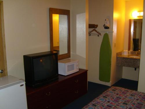 Koupelna v ubytování Stagecoach Inn Motel