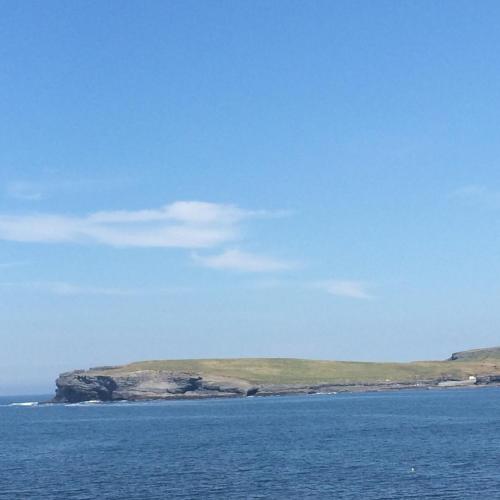an island in the middle of the ocean at Kilkee Bay Apartments in Kilkee