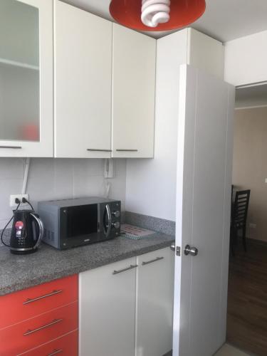 Кухня или кухненски бокс в Departamento Edificio Terrazas de Sol