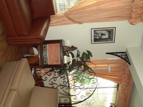 an overhead view of a room with a table and a window at Hostal Gemina in Lima