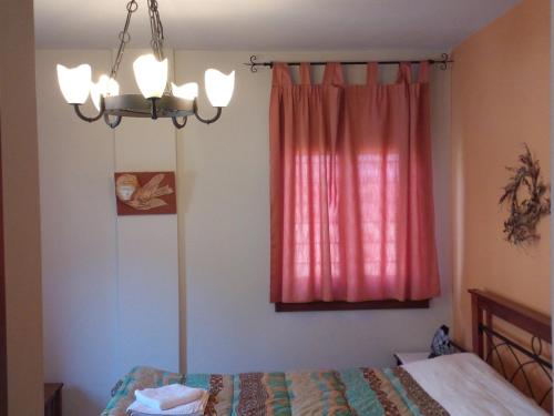 Katil atau katil-katil dalam bilik di Guesthouse Kalosorisma