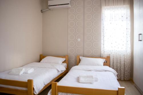 Ένα ή περισσότερα κρεβάτια σε δωμάτιο στο Di Angolo Apartments