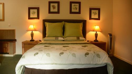 מיטה או מיטות בחדר ב-Les noyers aulnay