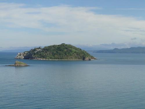 an island in the middle of a large body of water at Paraiso del Pescador in Rincon de Guayabitos
