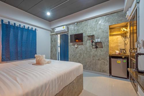Postel nebo postele na pokoji v ubytování BA​ Apartment​ Flow​Suvarnabhumi
