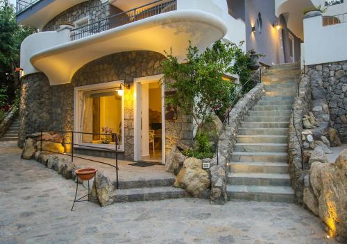 a set of stairs leading to a house at Villa Caruso in Ischia
