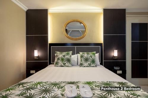 Katil atau katil-katil dalam bilik di Orchid Garden Suites