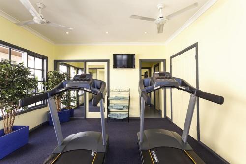 a gym with two tread machines in a room at Best Western Olde Maritime Motor Inn in Warrnambool