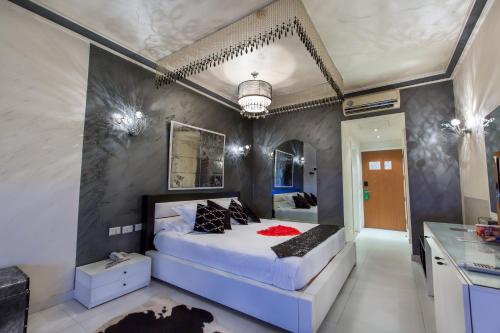 Ένα ή περισσότερα κρεβάτια σε δωμάτιο στο Princessa Hotel