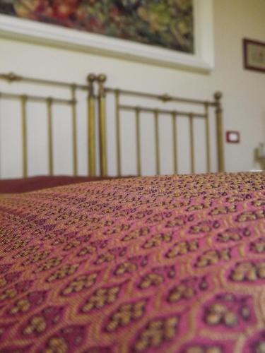 Ένα ή περισσότερα κρεβάτια σε δωμάτιο στο Agriturismo Podere il Fornacino