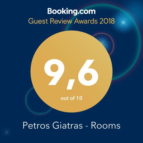 a yellow circle with the words guest review awards picture gliders rooms at Petros Giatras - Rooms in Zakynthos Town