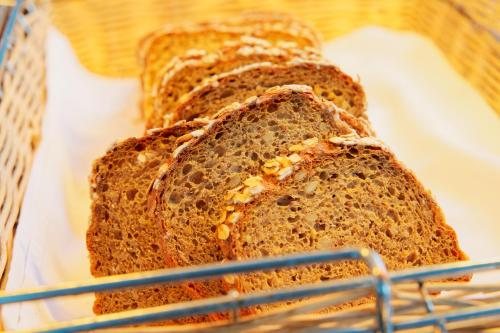 a loaf of bread sitting in a basket at Jugendgästehaus Brigittenau &Brigittenau Youth Palace in Vienna