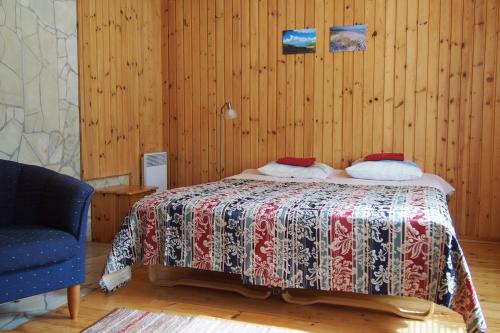 Vuode tai vuoteita majoituspaikassa Männi Guesthouse