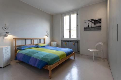Ένα ή περισσότερα κρεβάτια σε δωμάτιο στο Casa ALBERTINI