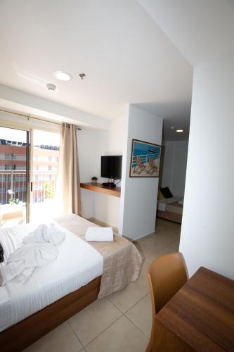 Postel nebo postele na pokoji v ubytování Motel Aviv