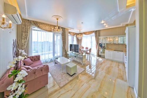 Телевизор и/или развлекательный центр в Harmony Suites - Monte Carlo