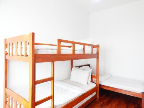 Ένα ή περισσότερα κρεβάτια σε δωμάτιο στο Wadi Iman Suites @ i-City