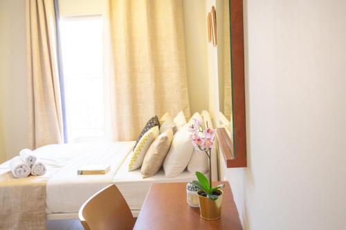 Postel nebo postele na pokoji v ubytování Motel Aviv