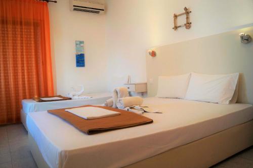 Katil atau katil-katil dalam bilik di Poseidon Seaview Studios