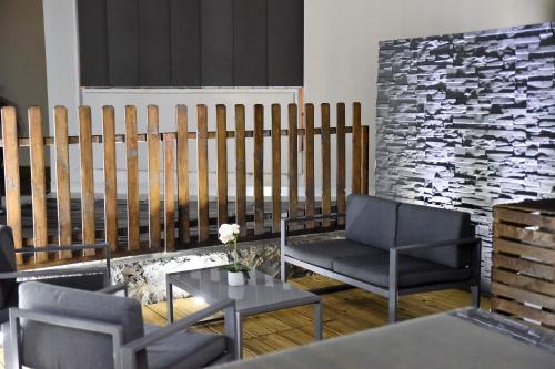 Posezení v ubytování T2 classé 4 étoiles avec jardin, piscine, vue mer à Saint-Gilles-les-Bains