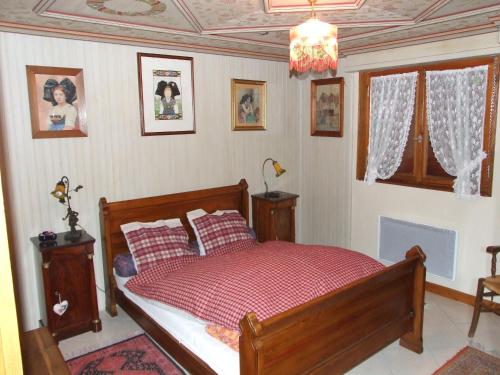 Postel nebo postele na pokoji v ubytování Gîte "Au Vigneron"