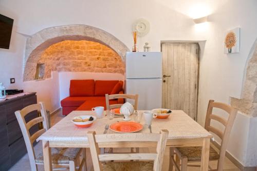 Kuchyň nebo kuchyňský kout v ubytování I trulli di Ginevra