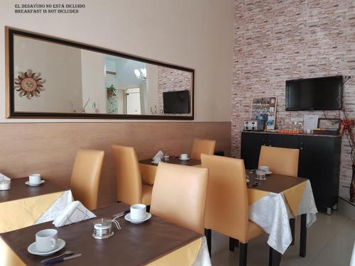 Restauracja lub miejsce do jedzenia w obiekcie San Carlos Hotel