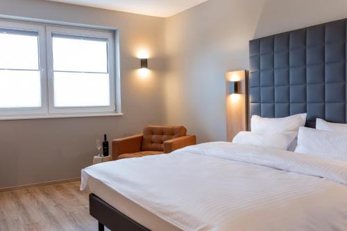 Postel nebo postele na pokoji v ubytování Hotel Circle Inn