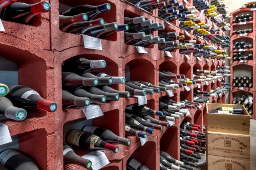 a wall of wine bottles in a wine cellar at Le Kaïla in Méribel
