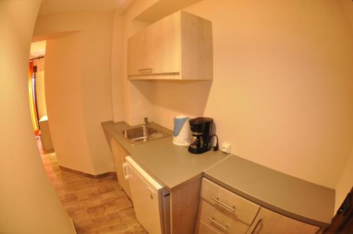 Una cocina o zona de cocina en PORTO TIMONI